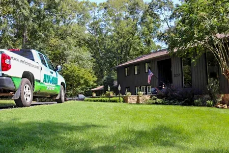 EnviroGreen truck in customer's driveway 